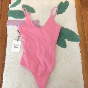 NWT Pink bodysuit Aritzia